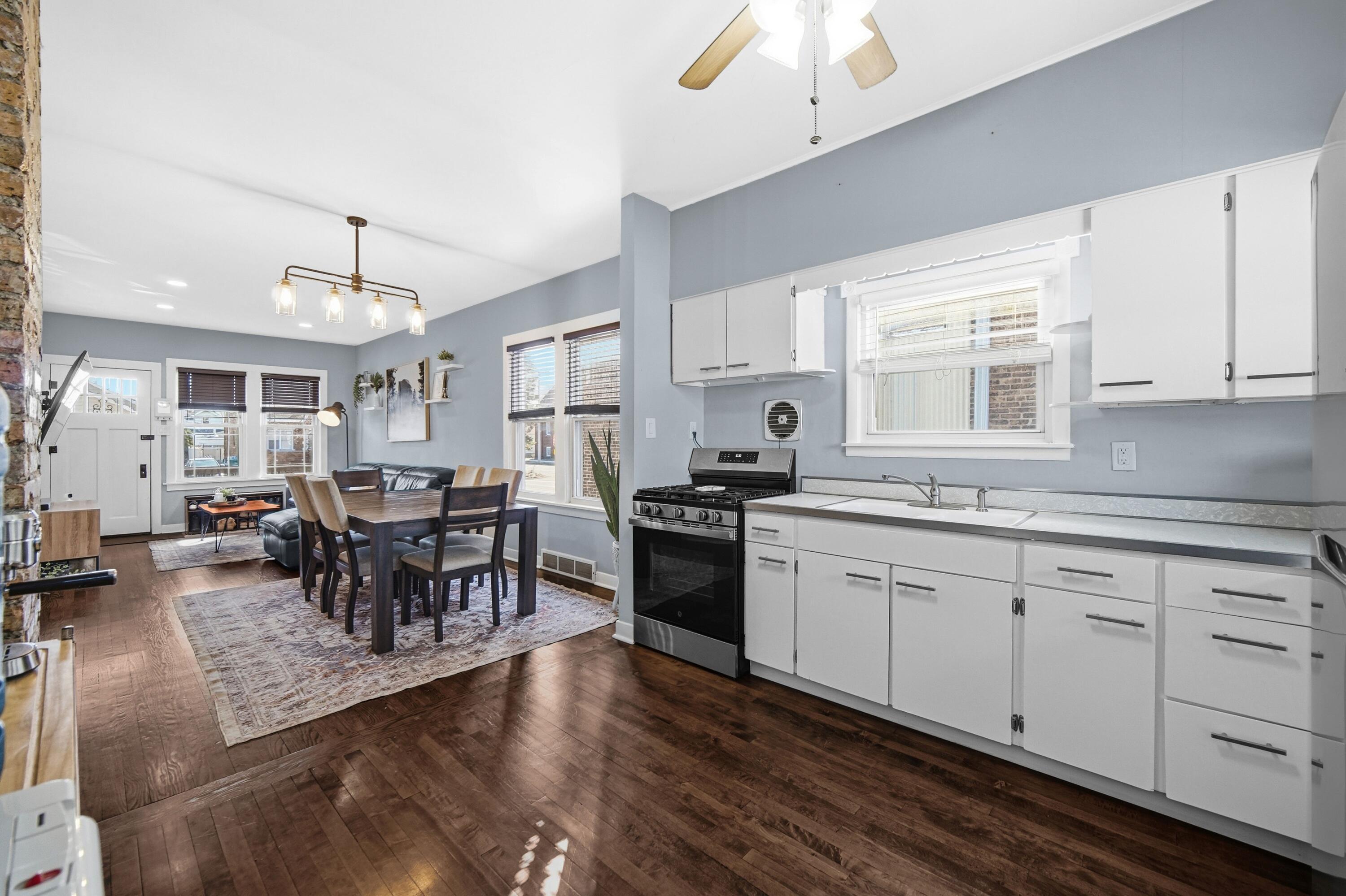 1346 Stanton Avenue Whiting, IN 46394 - Photo 7 of 19 a kitchen with sink cabinets and window
