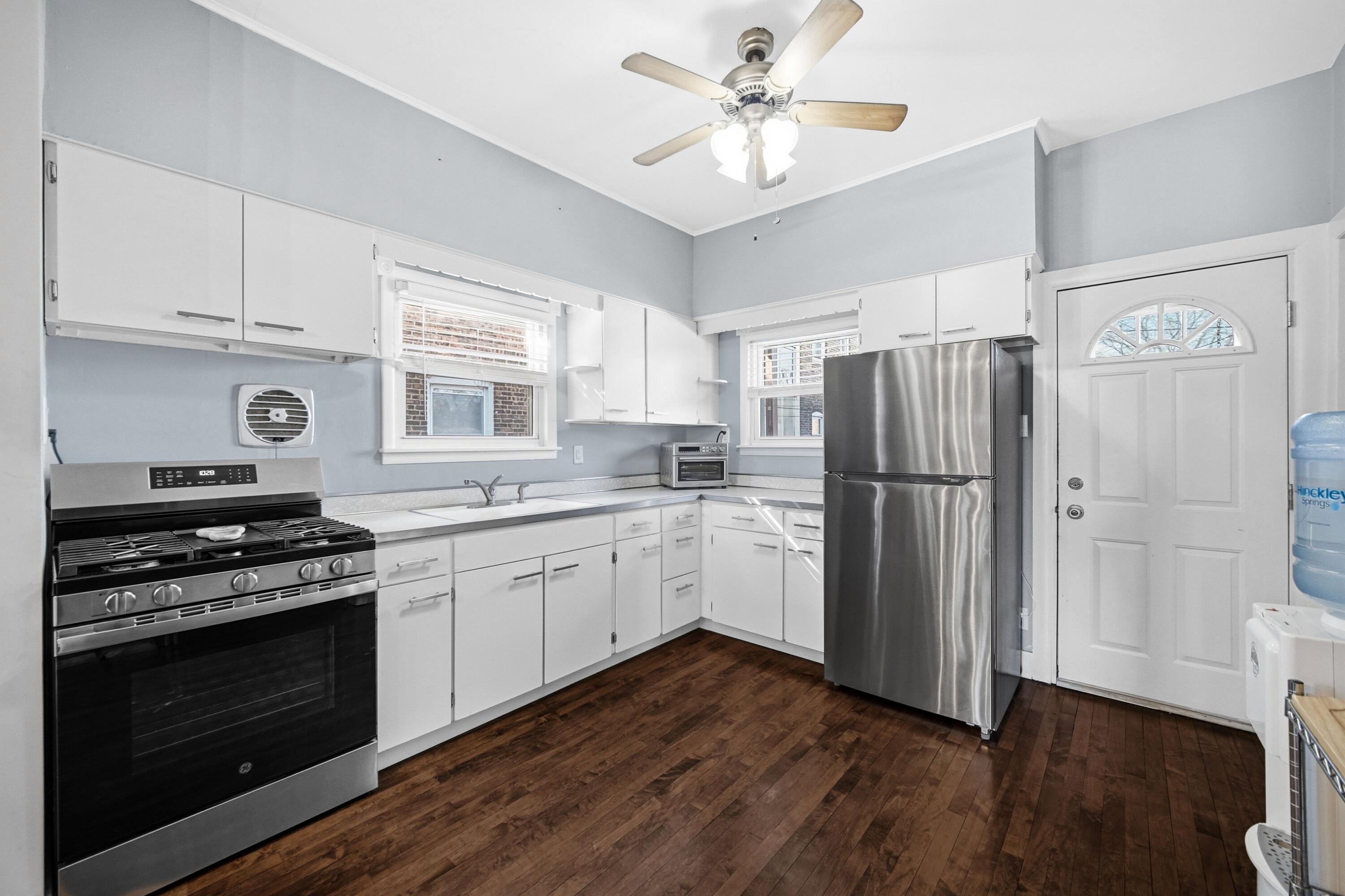 1346 Stanton Avenue Whiting, IN 46394 - Photo 9 of 19 a kitchen with a stove a refrigerator and a sink