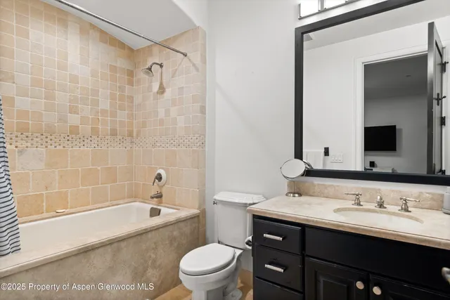 a view of outdoor sitting area with furniture and garden