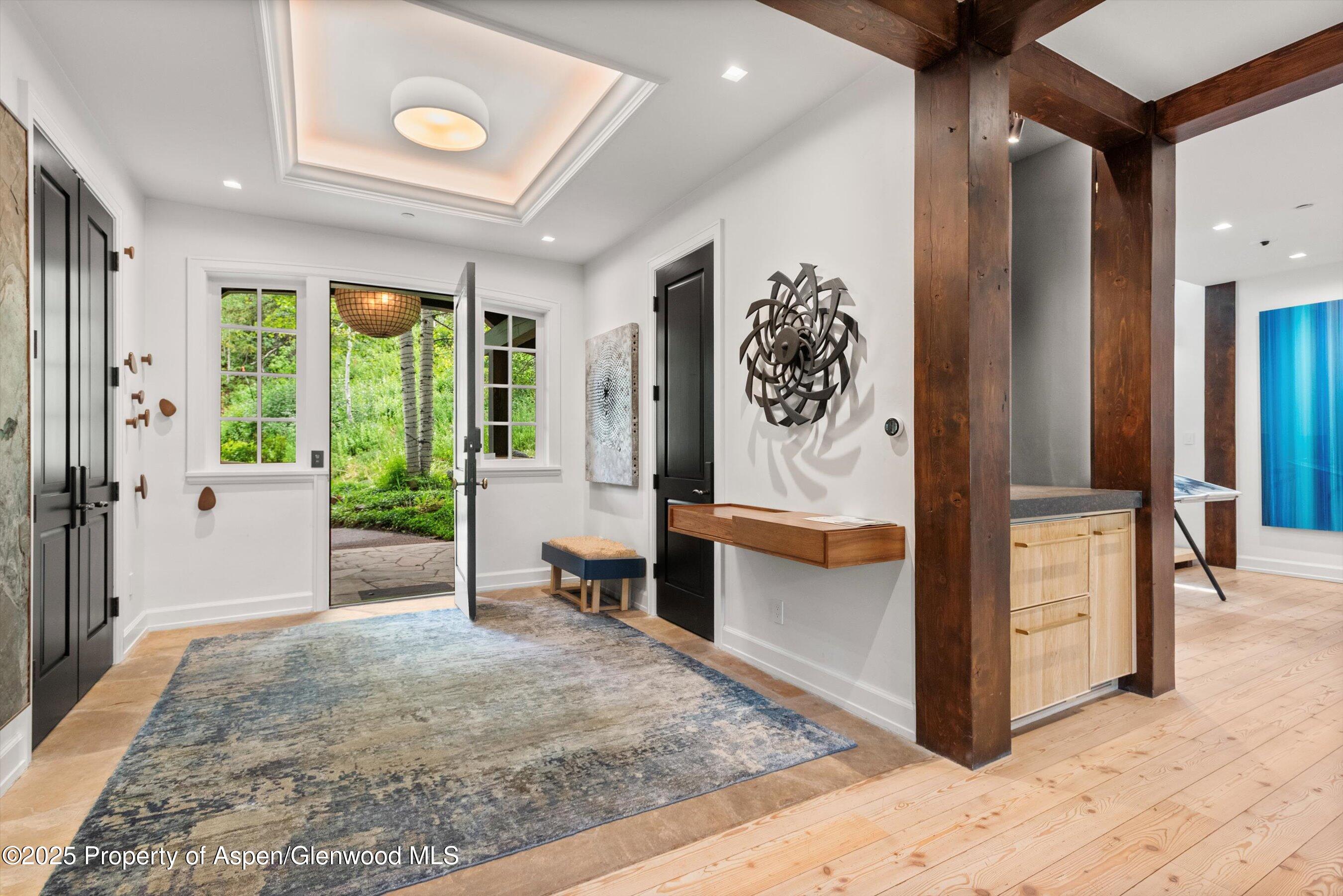 289 Exhibition Lane Aspen, CO 81611 - Photo 26 of 46 a view of a entryway door and hallway