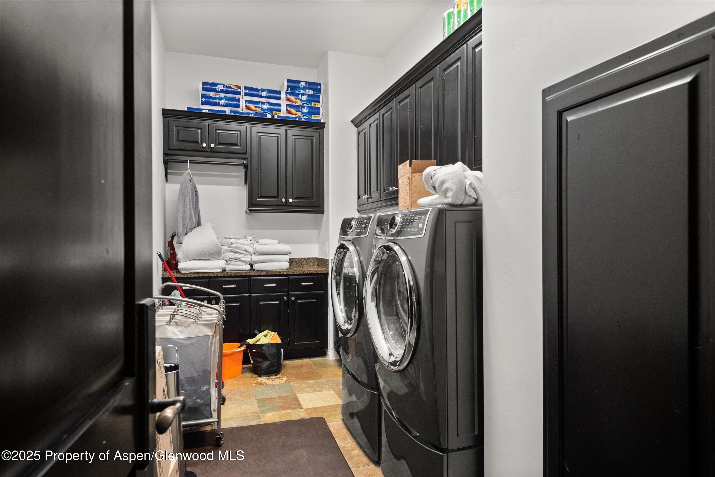 289 Exhibition Lane Aspen, CO 81611 - Photo 46 of 46 a utility room with dryer and washer