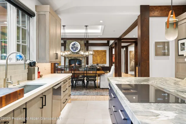 a very nice looking kitchen with a large window