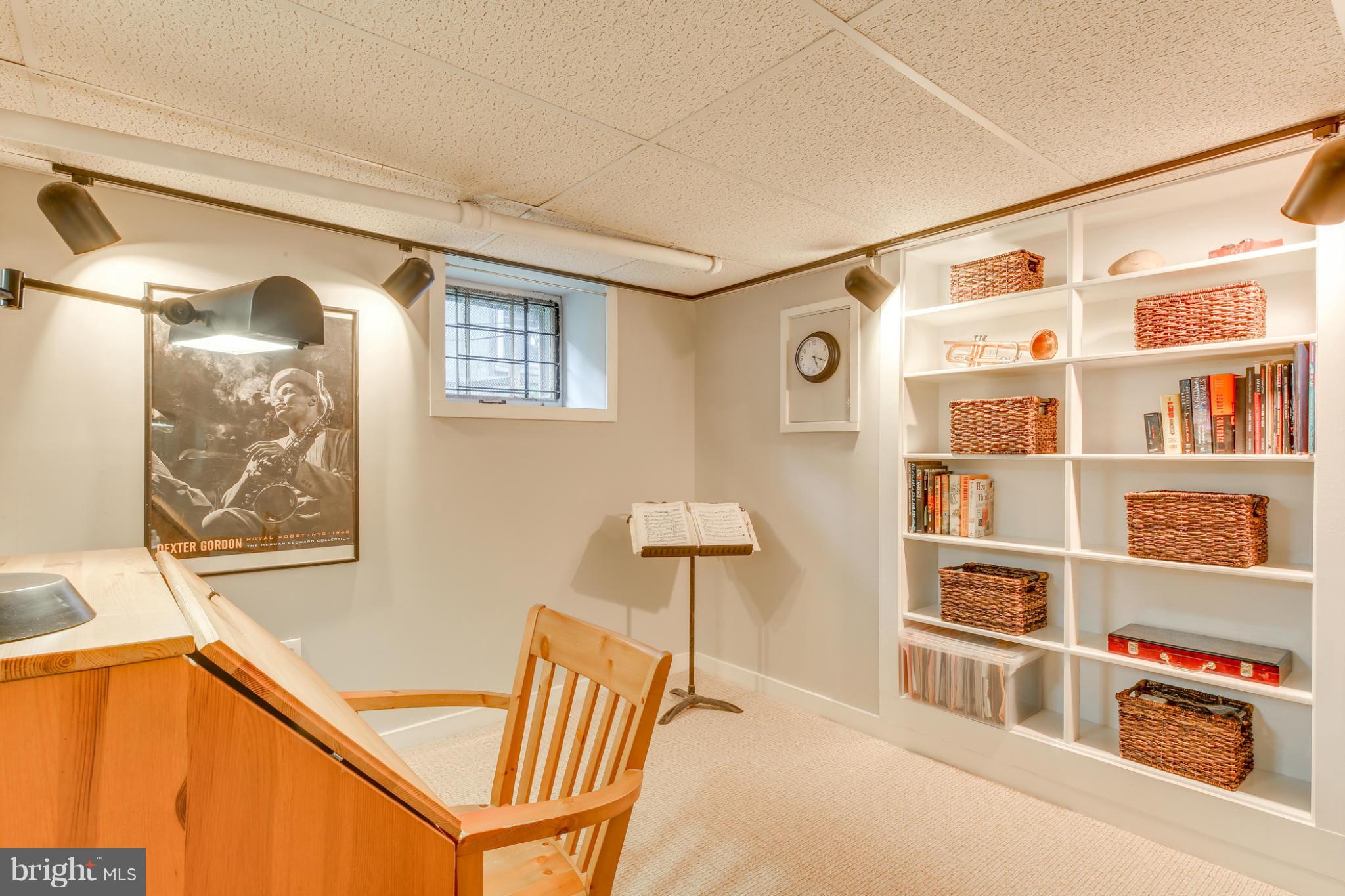 1313 Asbury Road Baltimore, MD 21209 - Photo 24 of 30 a living room with furniture and a window