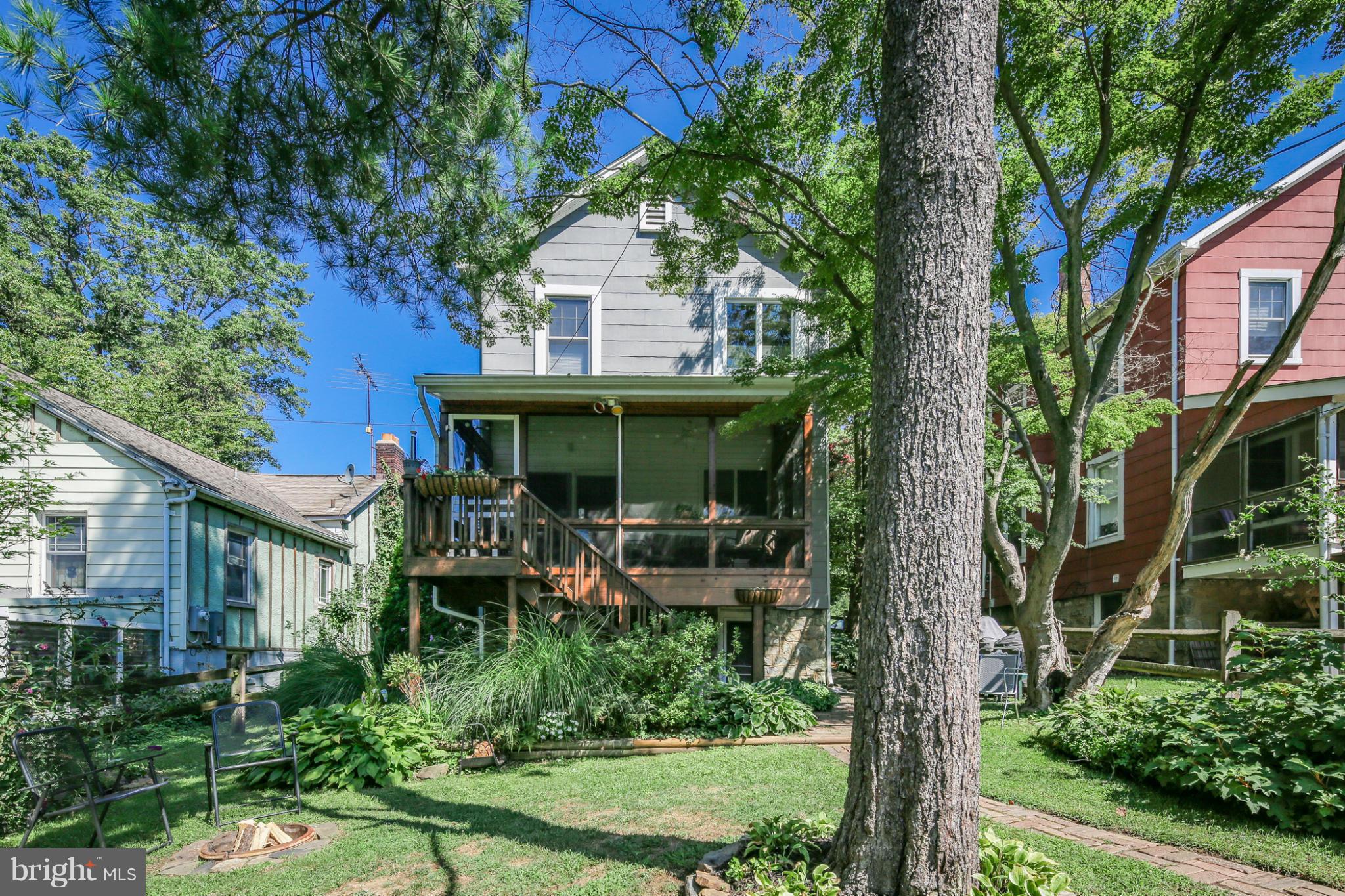 1313 Asbury Road Baltimore, MD 21209 - Photo 26 of 30 a view of house with a yard and garden