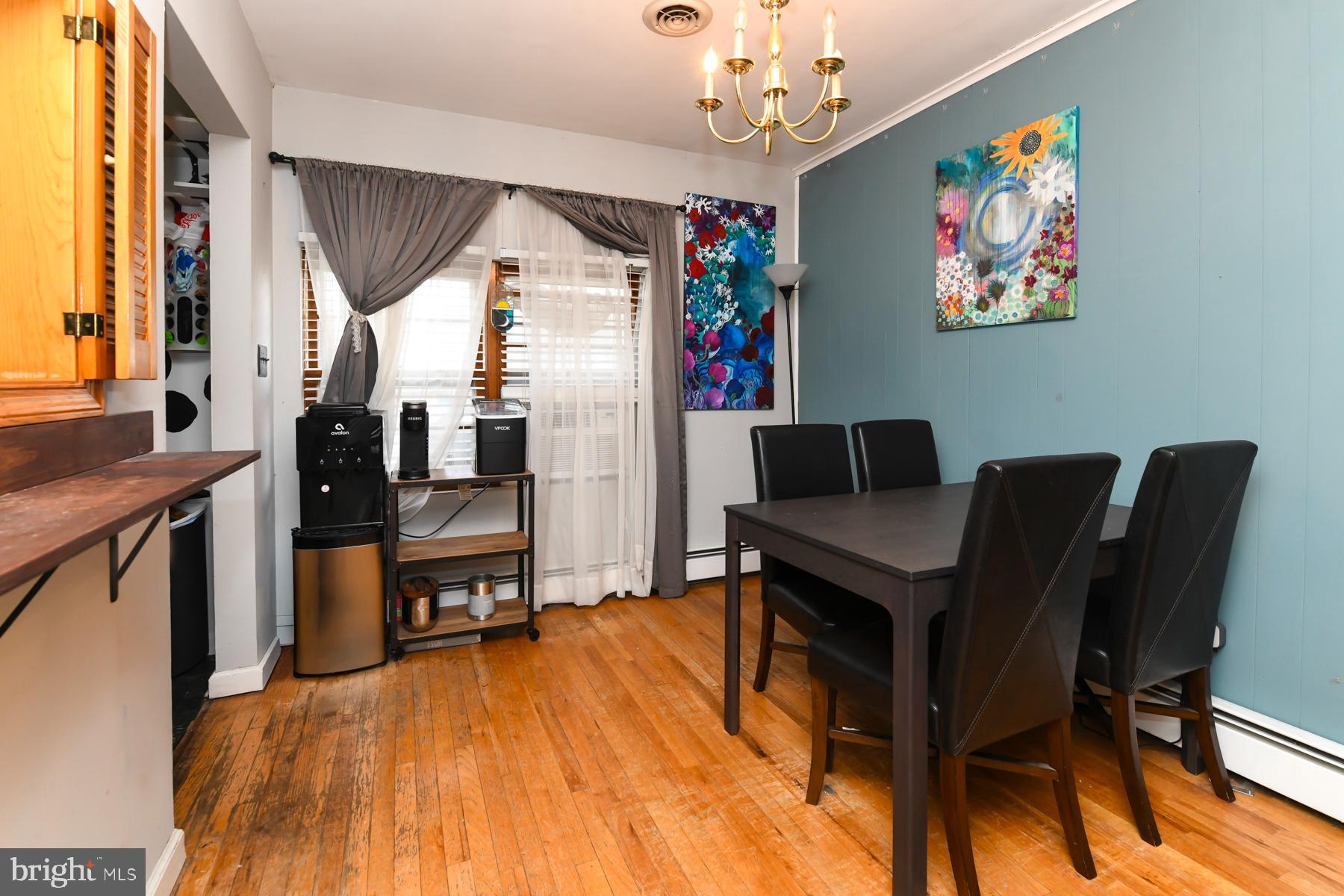 111 Atkins Avenue Hamilton, NJ 08610 - Photo 5 of 11 a view of a dining room with furniture window and wooden floor