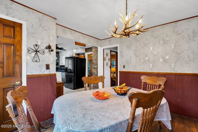 a view of a dining room with furniture
