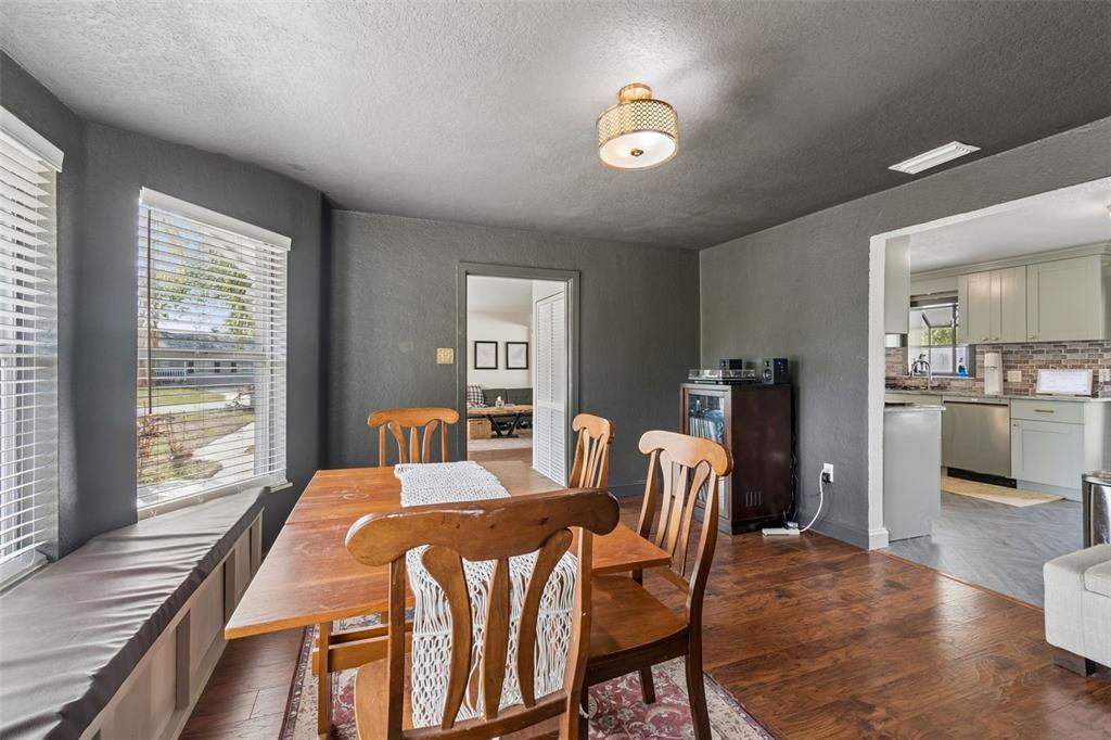 2301 West Eldred Drive Tampa, FL 33603 - Photo 11 of 34 a bedroom with a bed and wooden floor