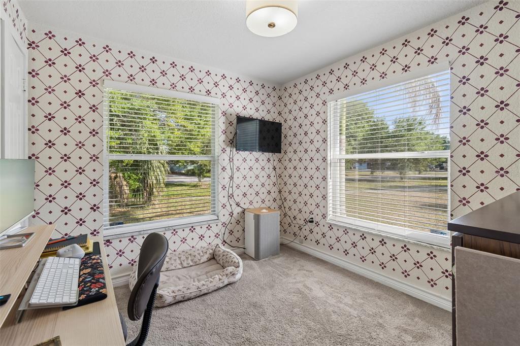 2301 West Eldred Drive Tampa, FL 33603 - Photo 15 of 34 a living room with furniture and a window