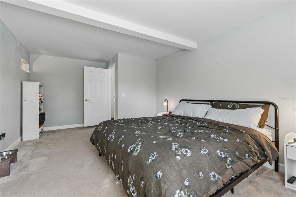 2301 West Eldred Drive Tampa, FL 33603 - Photo 21 of 34 a bedroom with a bed and closet