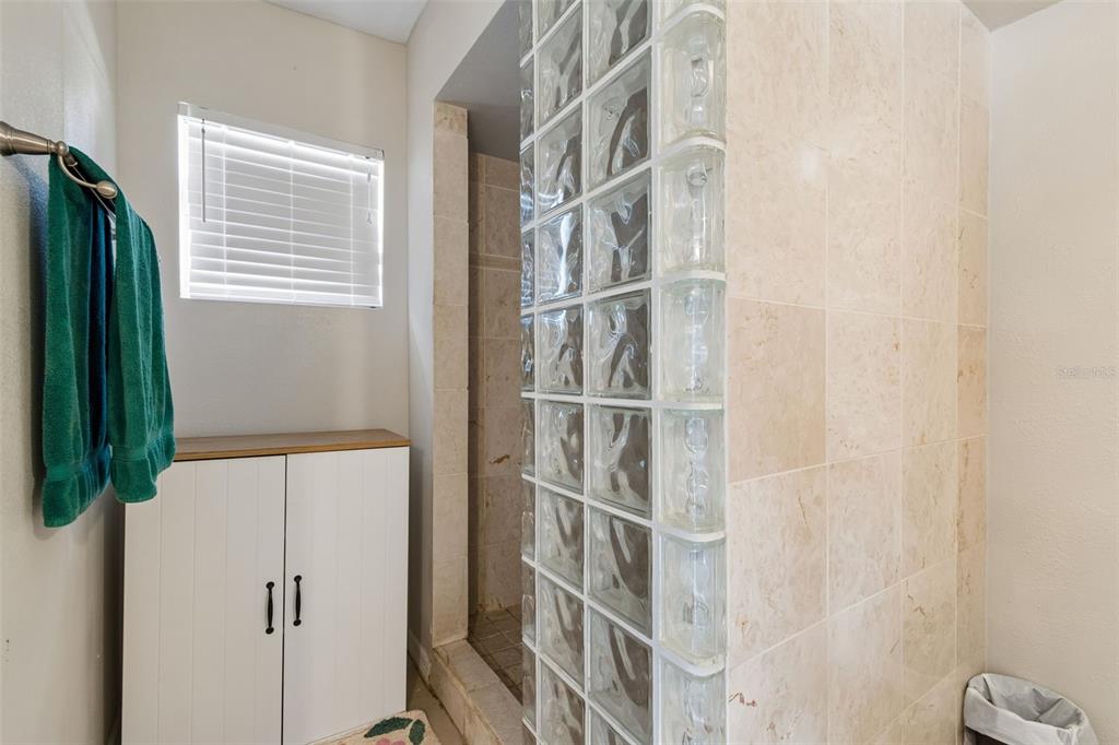 2301 West Eldred Drive Tampa, FL 33603 - Photo 26 of 34 a view of staircase with white walls and a window