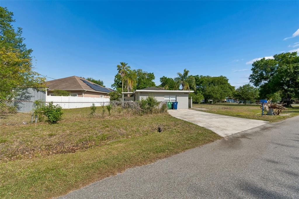 2301 West Eldred Drive Tampa, FL 33603 - Photo 30 of 34 a view of a house with a yard
