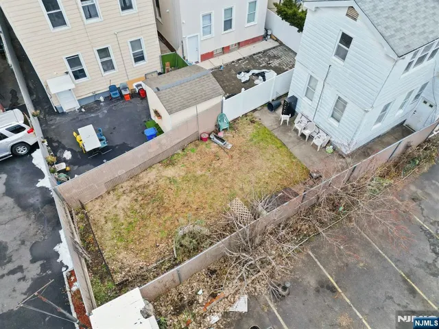 an aerial view of residential house with outdoor space