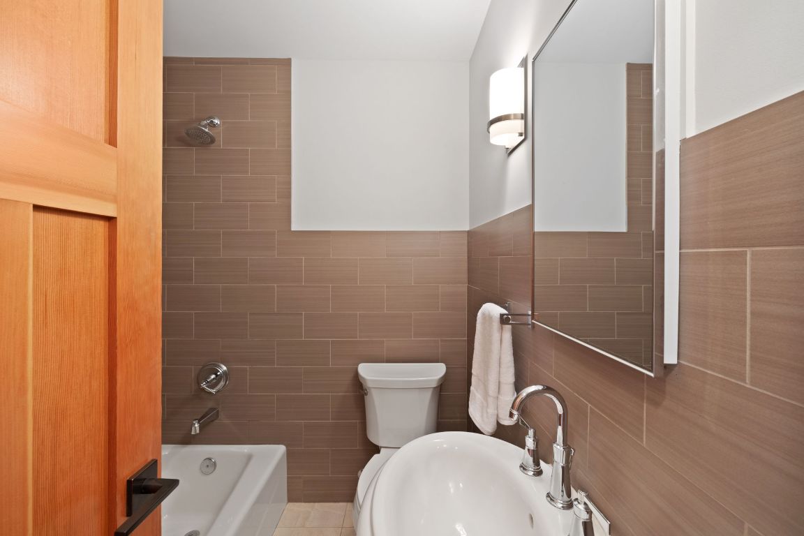 2300 South 3rd Street Austin, TX 78704 - Photo 23 of 39 a bathroom with a toilet sink and mirror