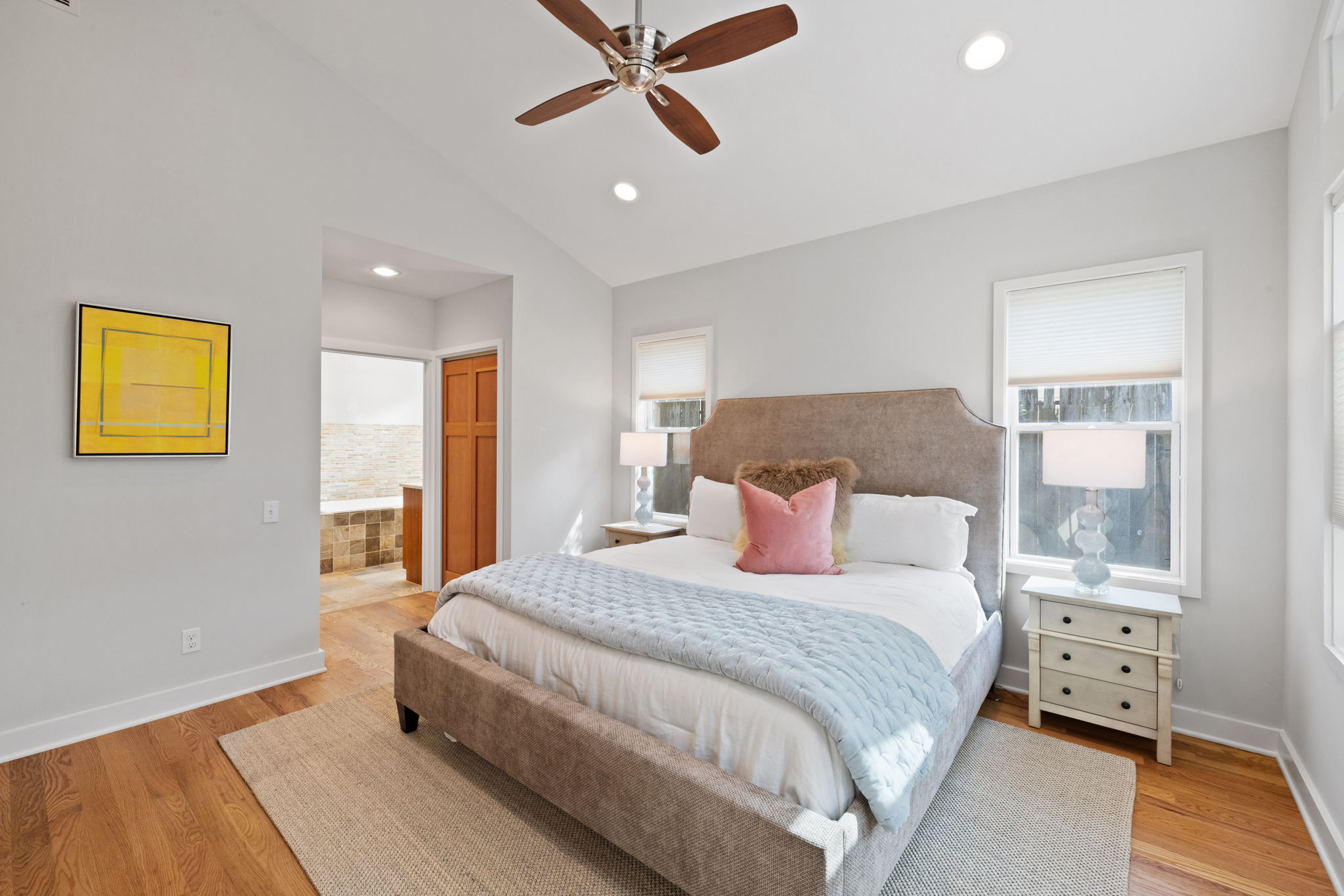 2300 South 3rd Street Austin, TX 78704 - Photo 26 of 39 Bedroom with baseboards, vaulted ceiling, recessed lighting, and light wood-type flooring