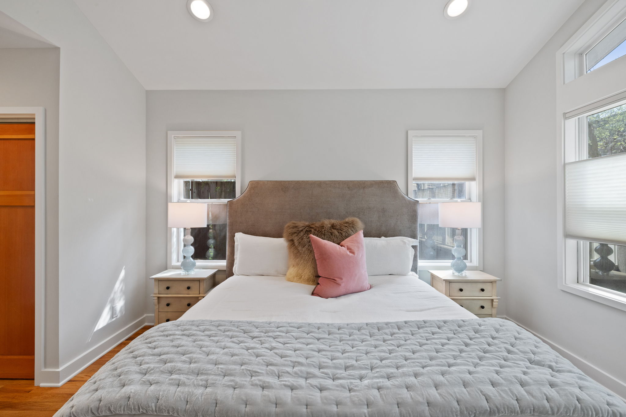 2300 South 3rd Street Austin, TX 78704 - Photo 27 of 39 Bedroom featuring baseboards, wood finished floors, and recessed lighting