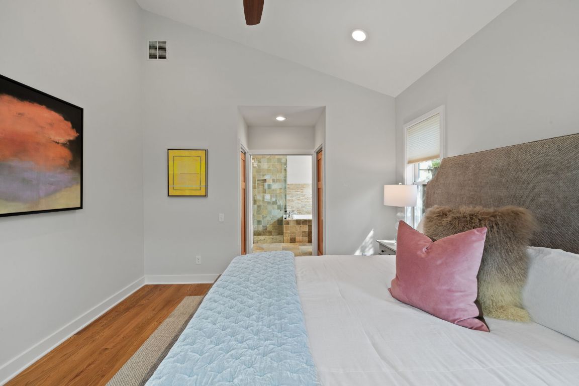 2300 South 3rd Street Austin, TX 78704 - Photo 29 of 39 a bedroom with a bed and a flat screen tv