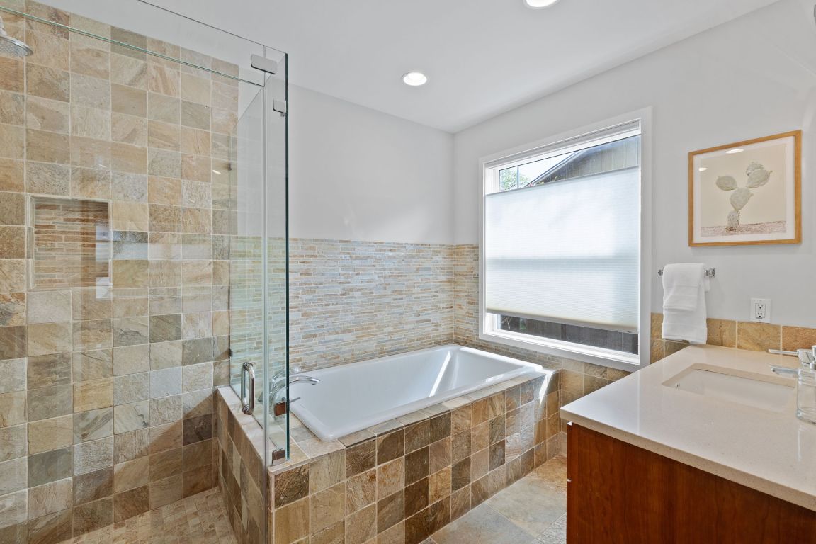 2300 South 3rd Street Austin, TX 78704 - Photo 31 of 39 a bathroom with a bathtub and a sink