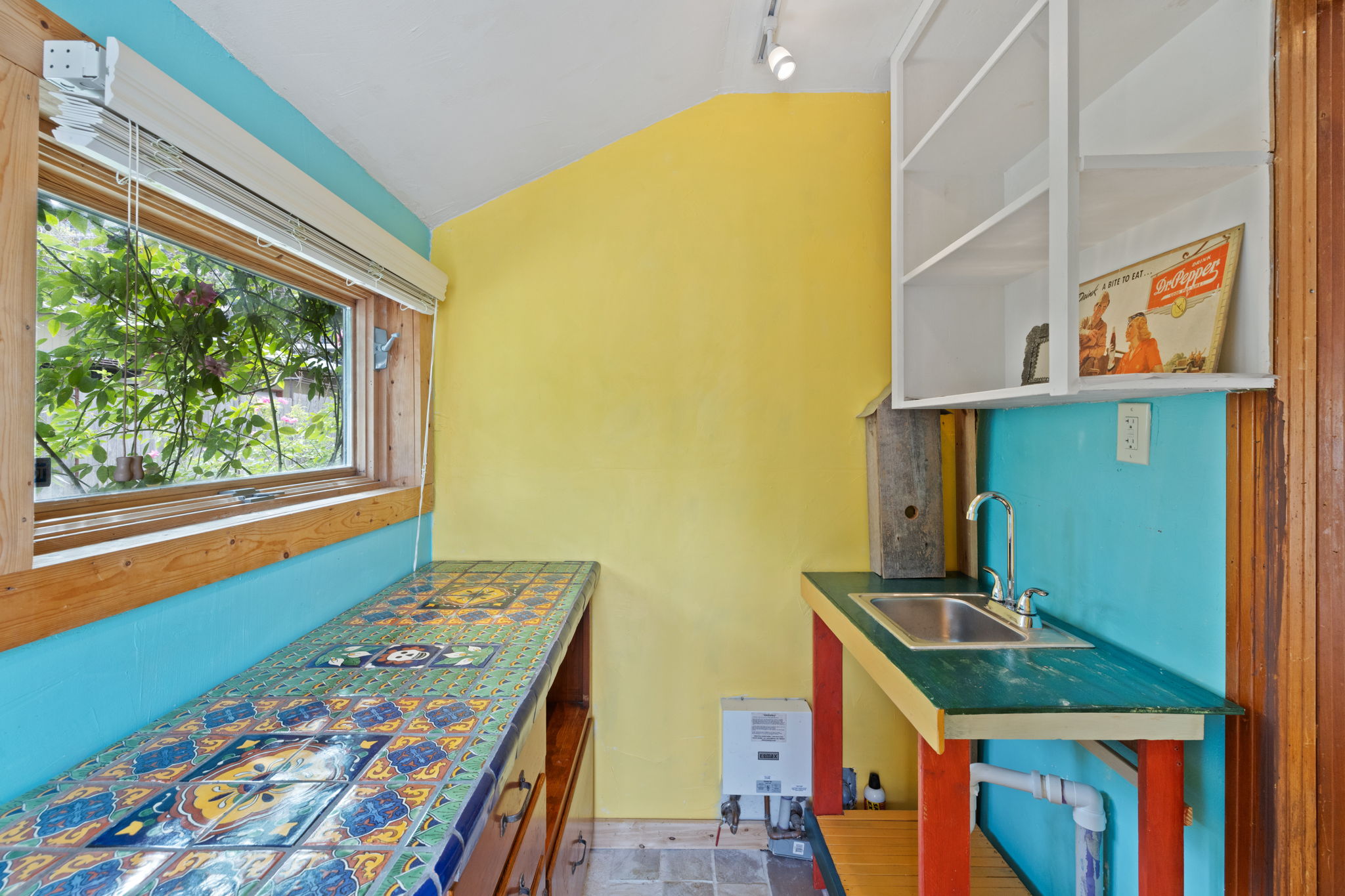2300 South 3rd Street Austin, TX 78704 - Photo 38 of 39 Kitchen with rail lighting, lofted ceiling, a sink, and open shelves