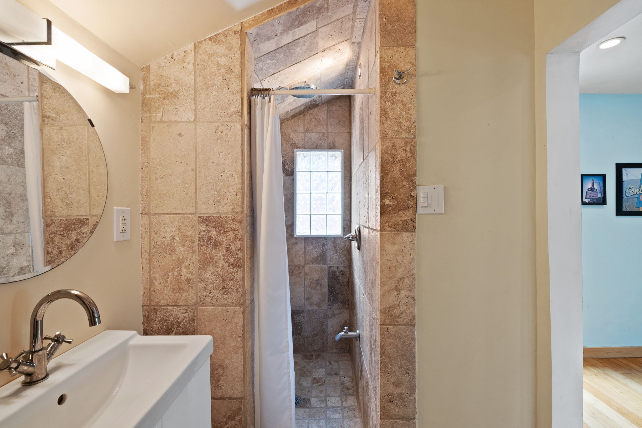 2300 South 3rd Street Austin, TX 78704 - Photo 39 of 39 Bathroom featuring a sink and a shower stall