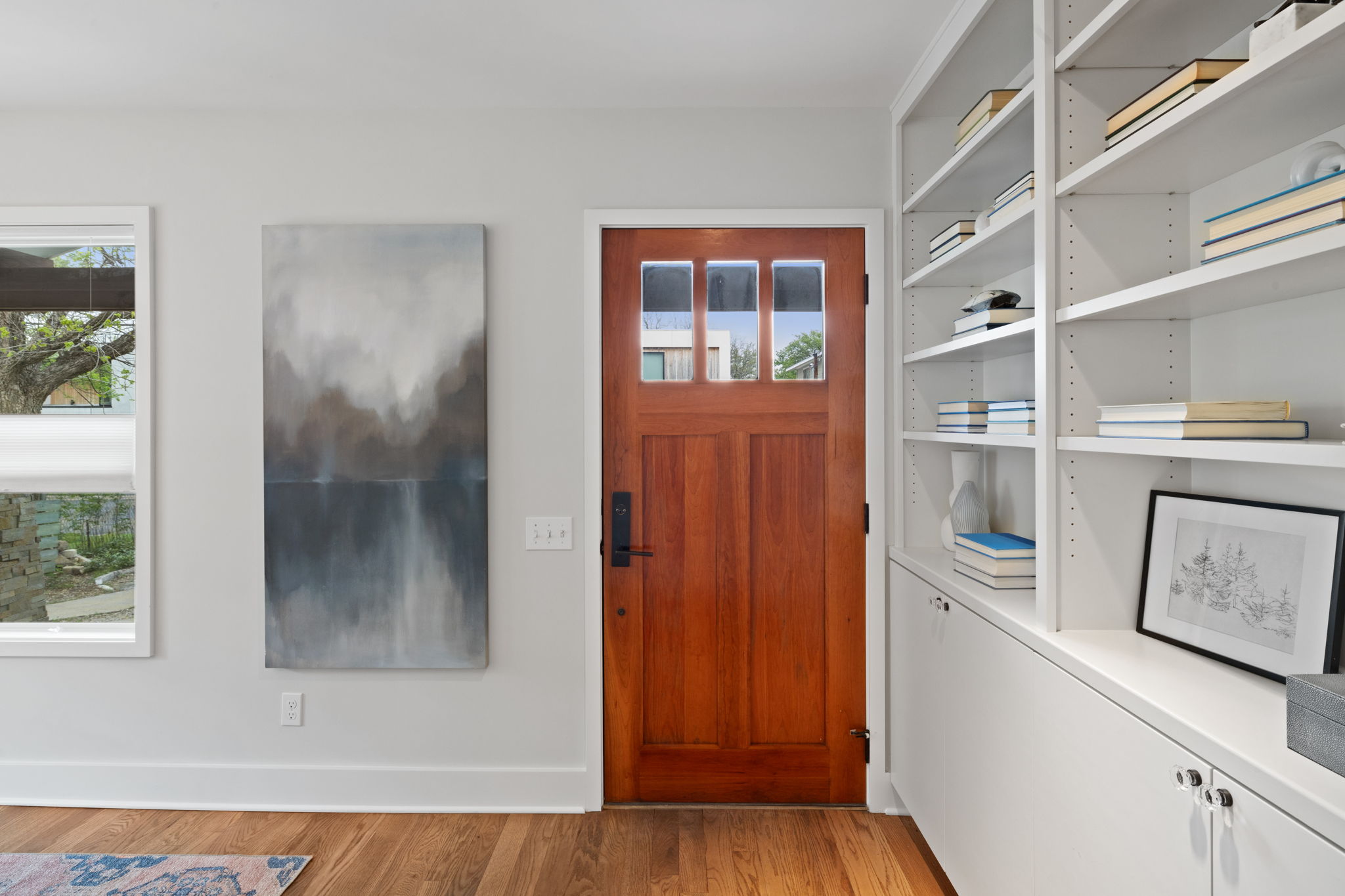 2300 South 3rd Street Austin, TX 78704 - Photo 4 of 39 Entrance foyer with baseboards and light wood-style flooring