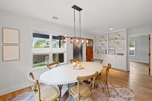 a view of a dining room with furniture