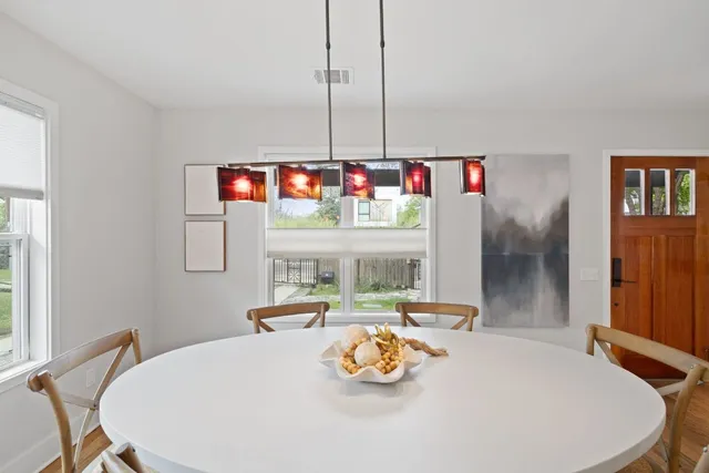 a kitchen with stainless steel appliances granite countertop a stove a sink dishwasher and a refrigerator