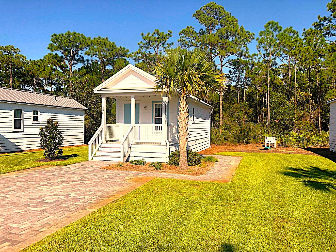 53 Rosin Cup Circle Santa Rosa Beach, FL 32459 - Photo 18 of 22 a view of a house with pool and chairs