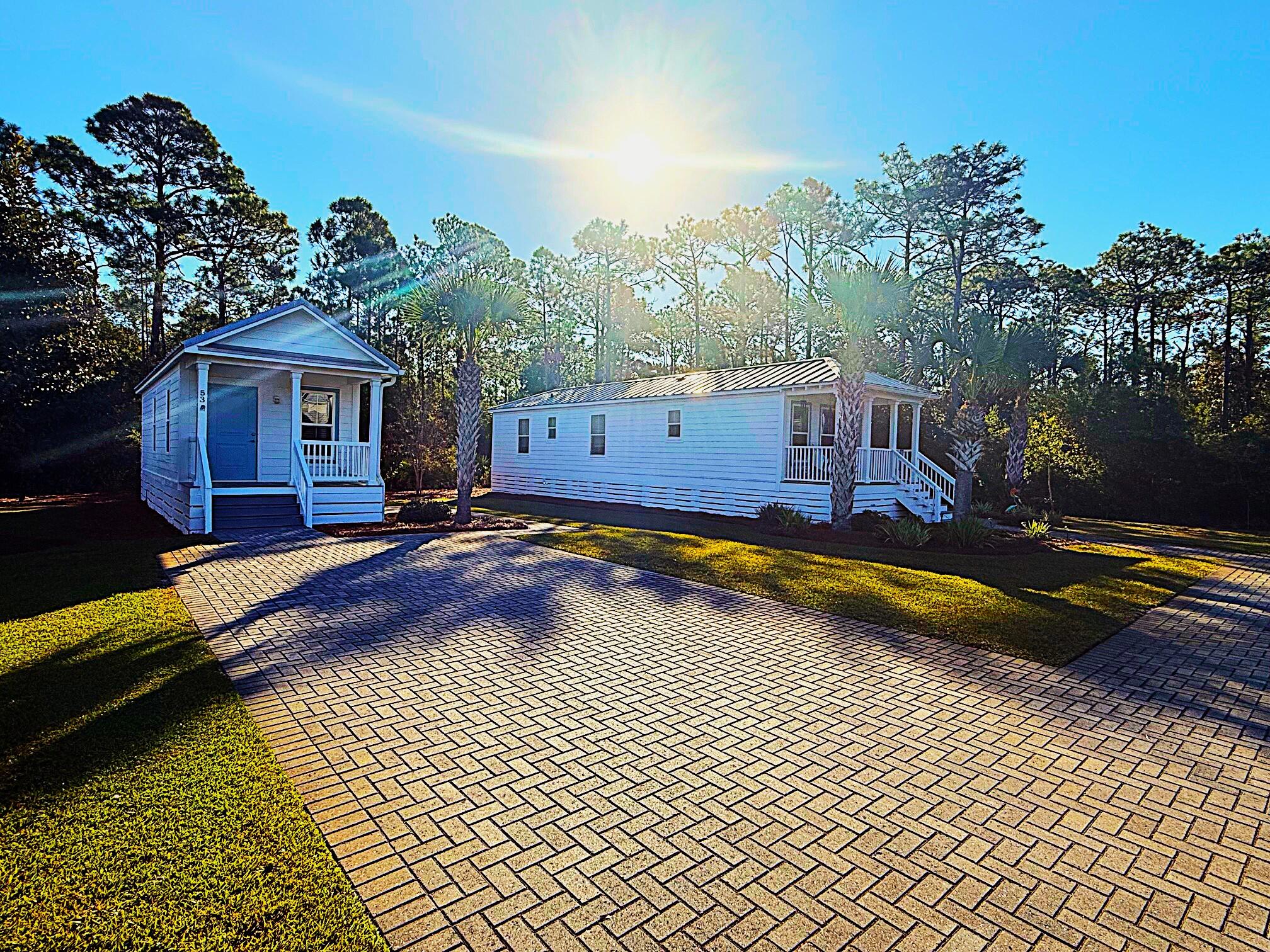 53 Rosin Cup Circle Santa Rosa Beach, FL 32459 - Photo 3 of 22 a view of a house with swimming pool