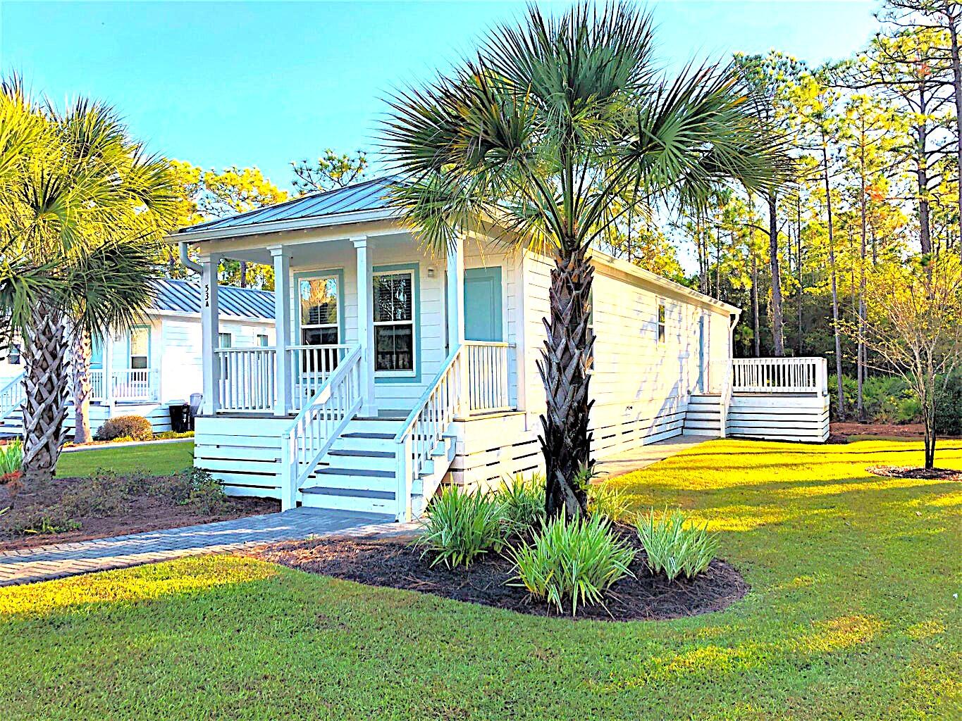 53 Rosin Cup Circle Santa Rosa Beach, FL 32459 - Photo 5 of 22 a view of a house with swimming pool and a small yard
