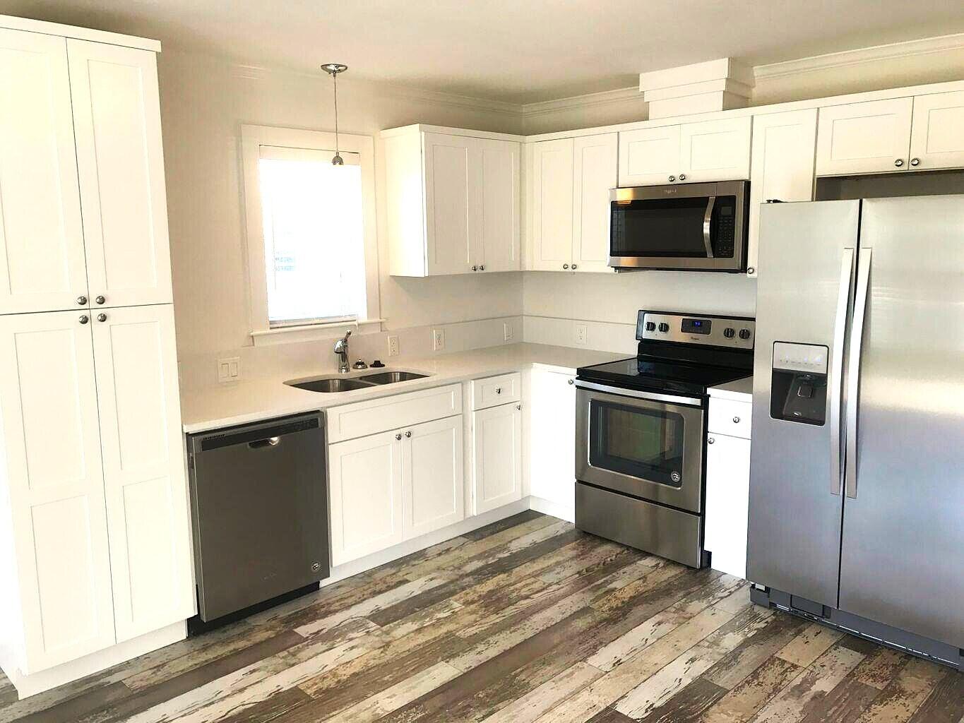 53 Rosin Cup Circle Santa Rosa Beach, FL 32459 - Photo 8 of 22 a kitchen with a sink stove and microwave