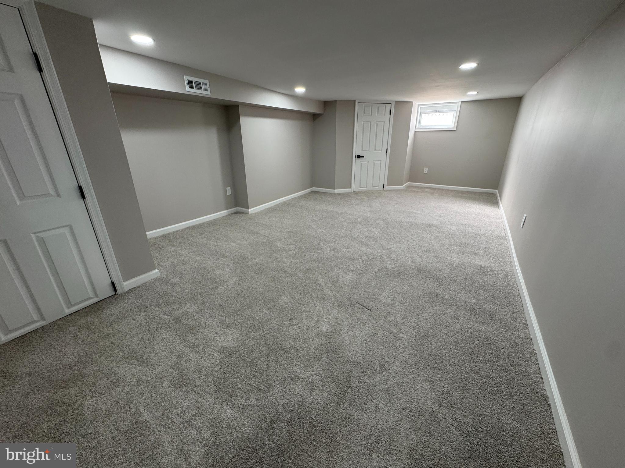 1106 South Carey Street Baltimore, MD 21223 - Photo 22 of 24 a view of hallway with stairs