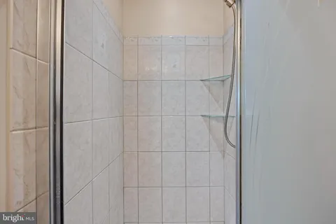 a view of workspace with wooden floor windows