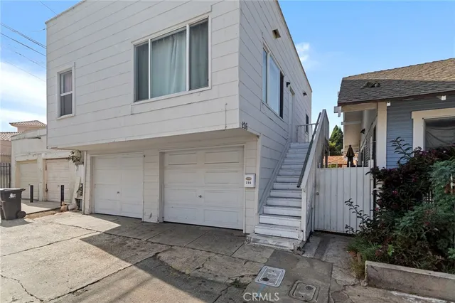 a view of a house with a garden