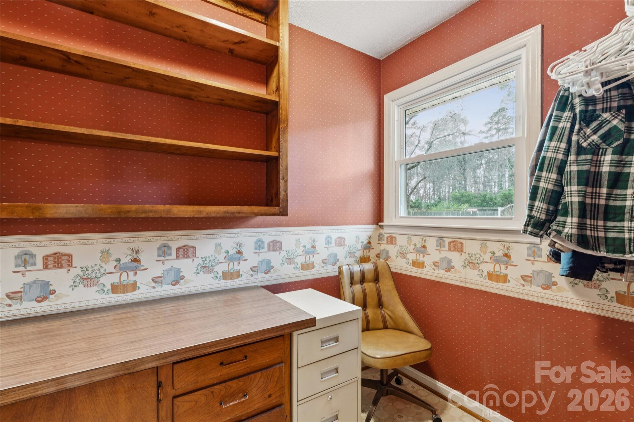 14409 Springwater Drive Matthews, NC 28105 - Photo 26 of 27 a room with a chair and window