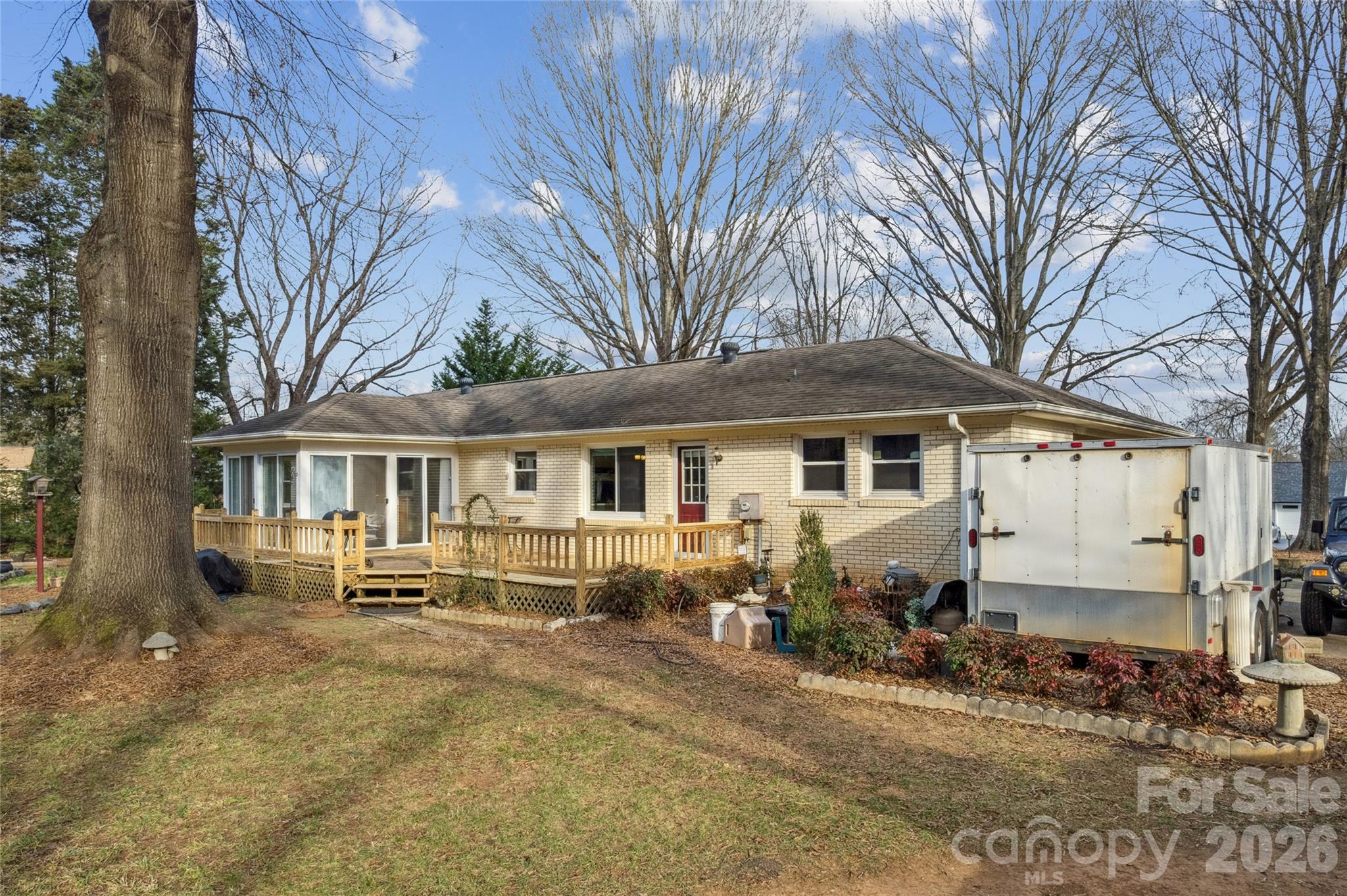 14409 Springwater Drive Matthews, NC 28105 - Photo 6 of 27 a front view of a house with yard