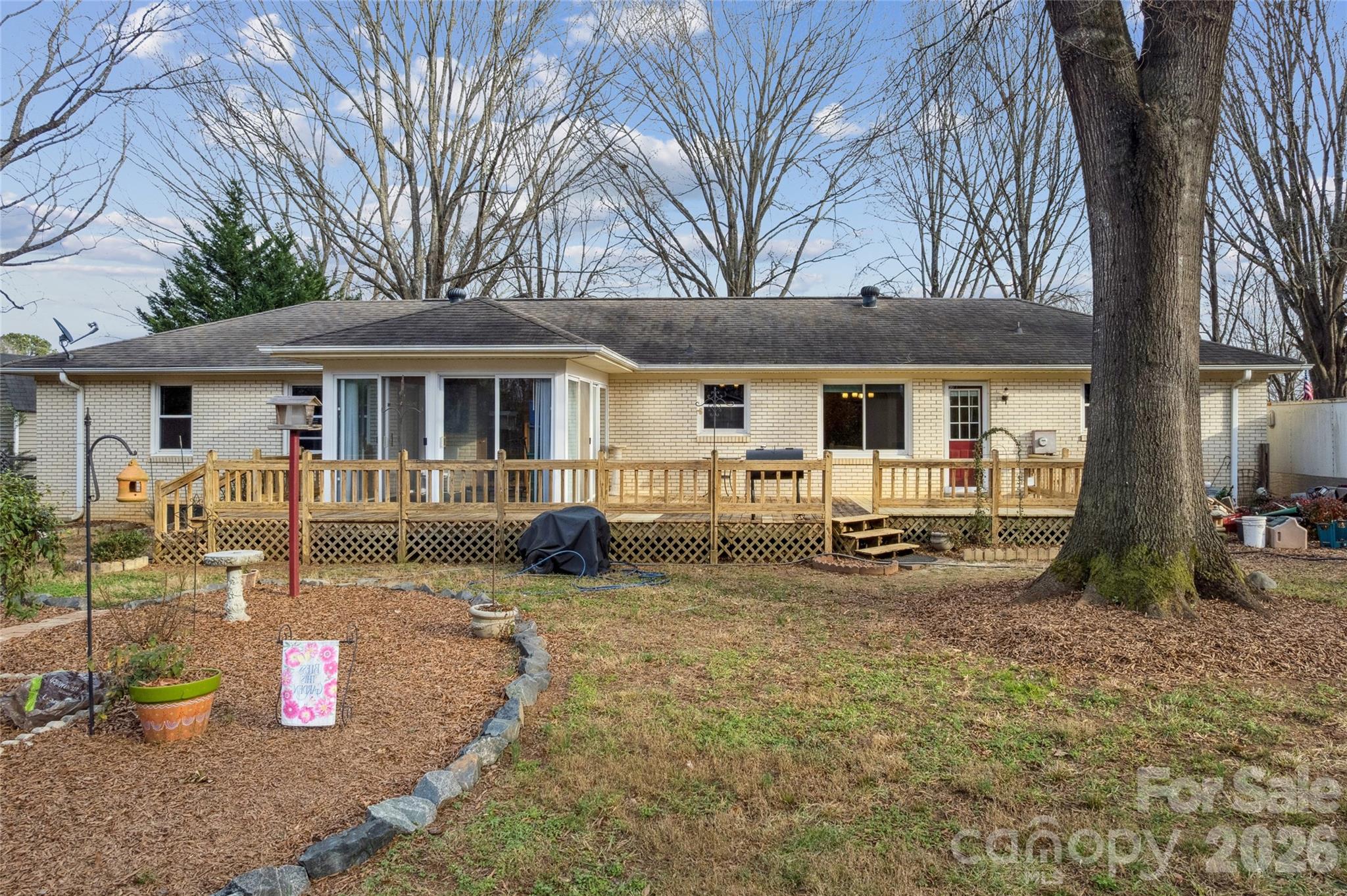 14409 Springwater Drive Matthews, NC 28105 - Photo 7 of 27 a view of a house with backyard
