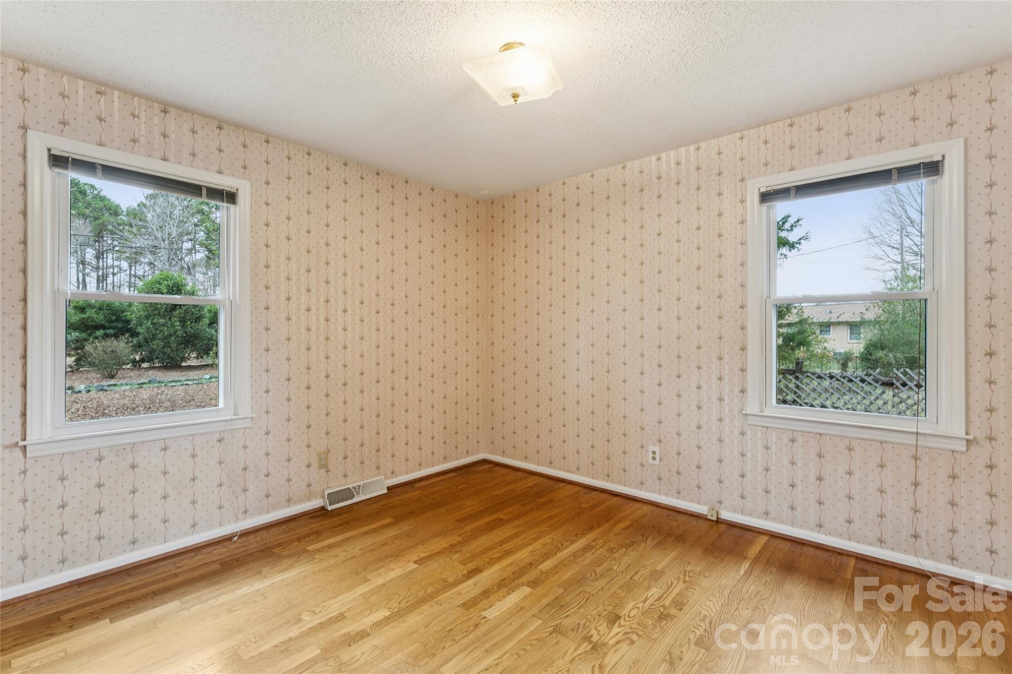 14409 Springwater Drive Matthews, NC 28105 - Photo 10 of 27 an empty room with a window