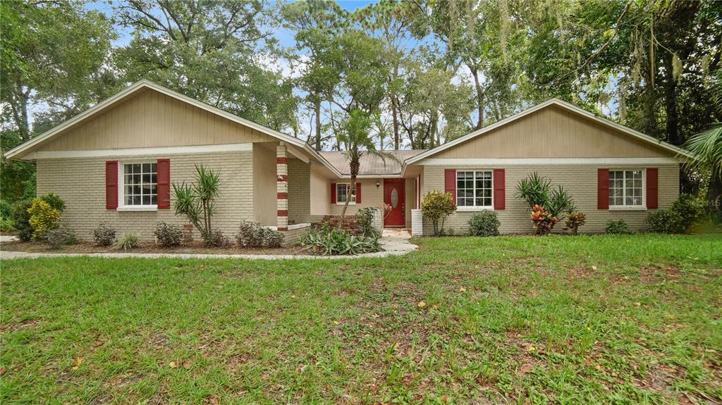 135 East Citrus Street Altamonte Springs, FL 32701 - Photo 1 of 33 a view of a house with yard and green space