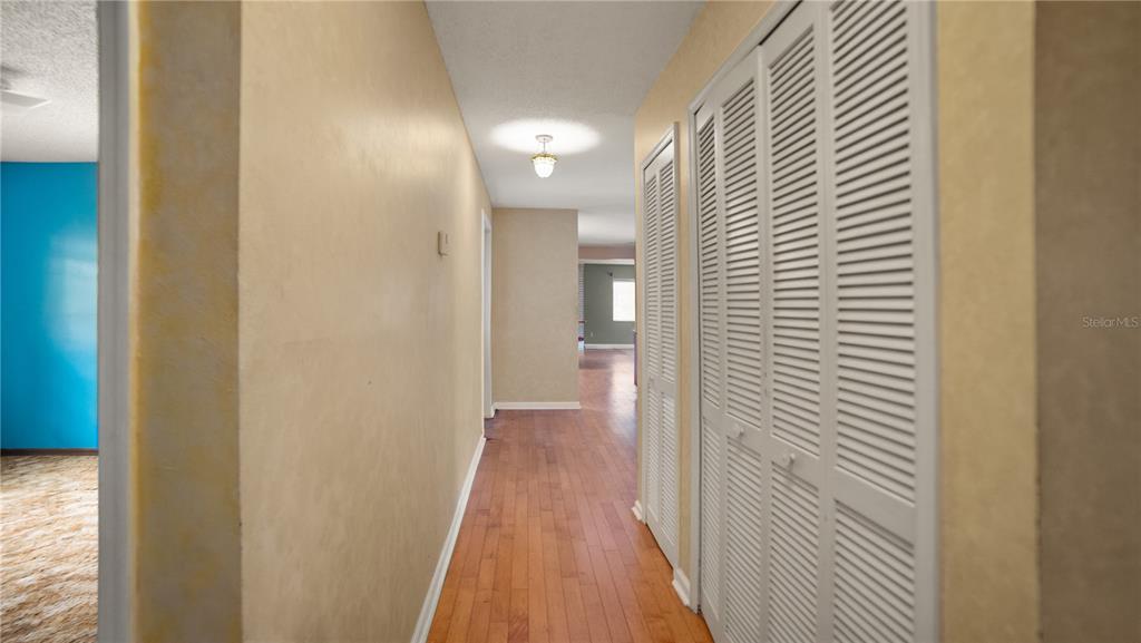 135 East Citrus Street Altamonte Springs, FL 32701 - Photo 14 of 33 a view of a hallway with wooden floor