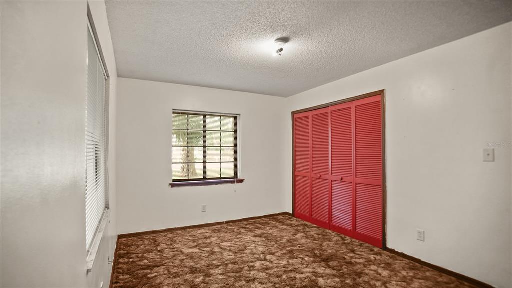 135 East Citrus Street Altamonte Springs, FL 32701 - Photo 18 of 33 an empty room with windows