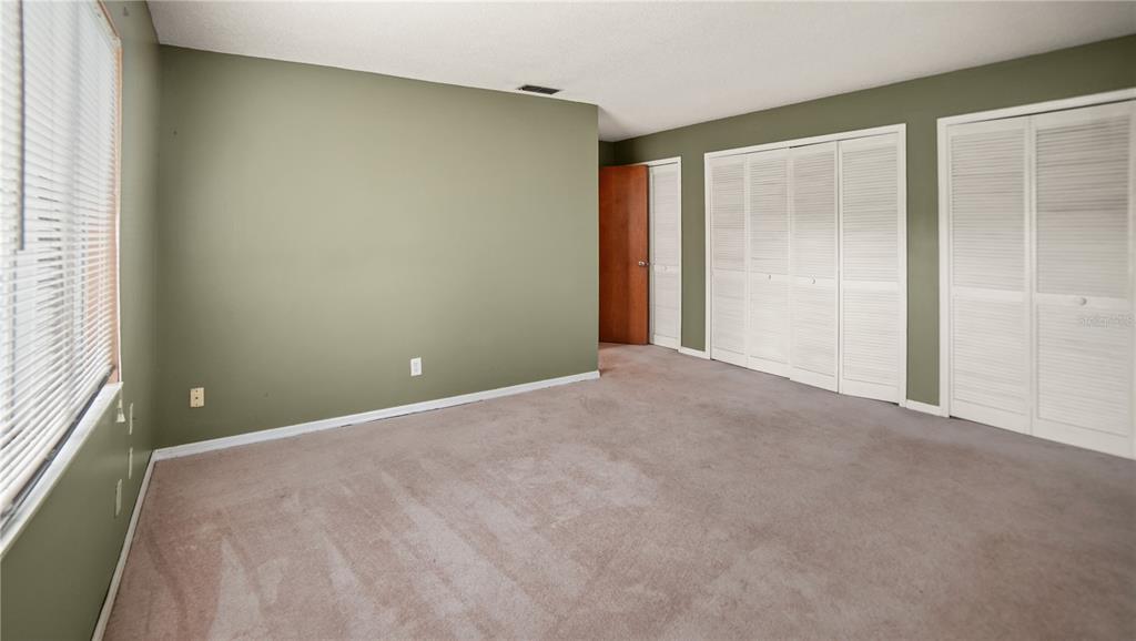 135 East Citrus Street Altamonte Springs, FL 32701 - Photo 24 of 33 a view of an empty room with a window
