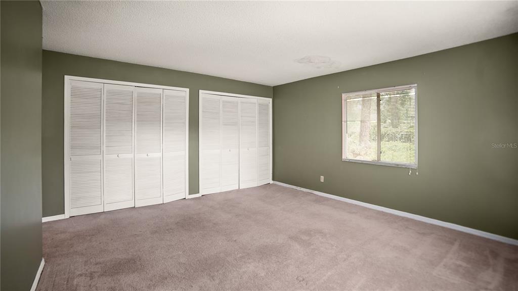 135 East Citrus Street Altamonte Springs, FL 32701 - Photo 25 of 33 a view of an empty room with a window