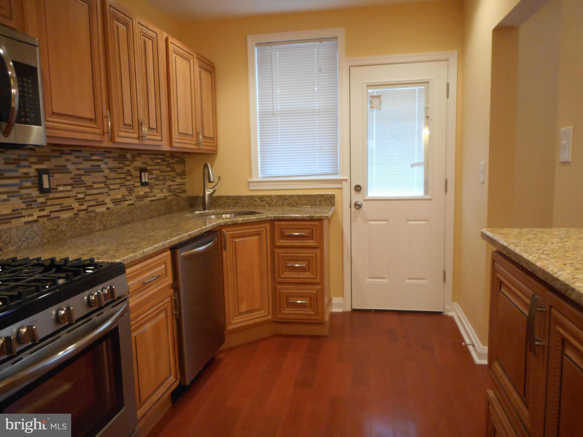 3906 Edgewood Road Baltimore, MD 21215 - Photo 1 of 29 All New Spacious Kitchen
