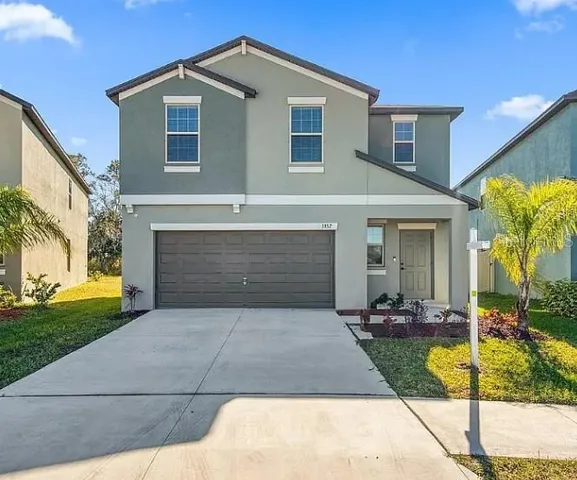 a front view of house with yard