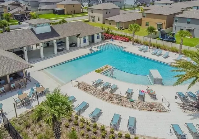 a view of a house with a swimming pool