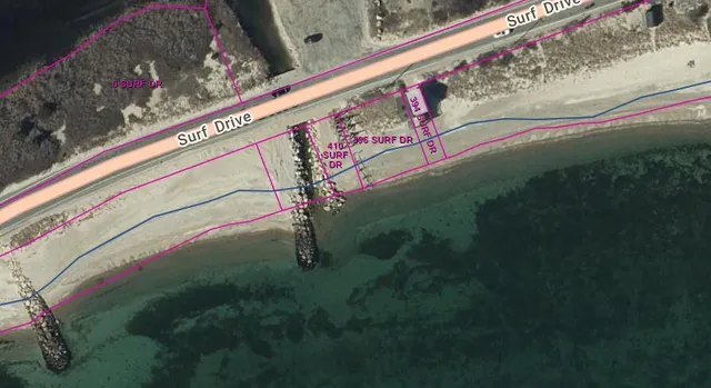 a close up of a wall with a street