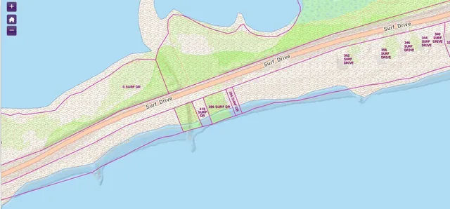 a white sign that is sitting on a wall