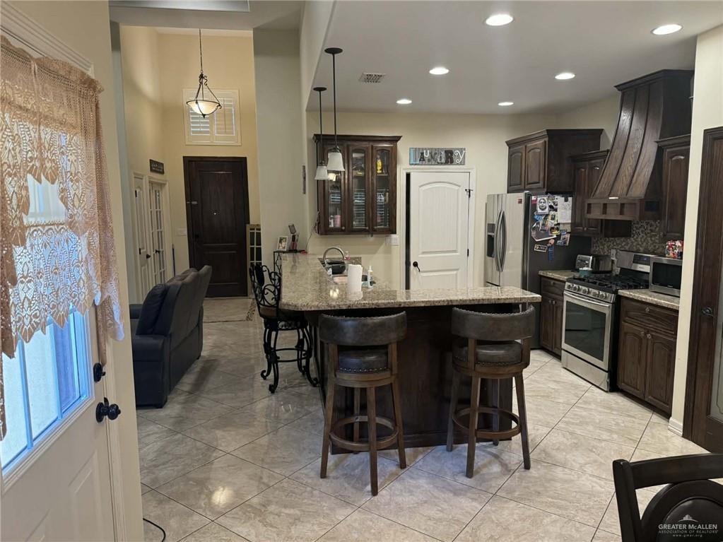 4014 Magdalena Street Mission, TX 78573 - Photo 6 of 9 a view of a dining room with furniture