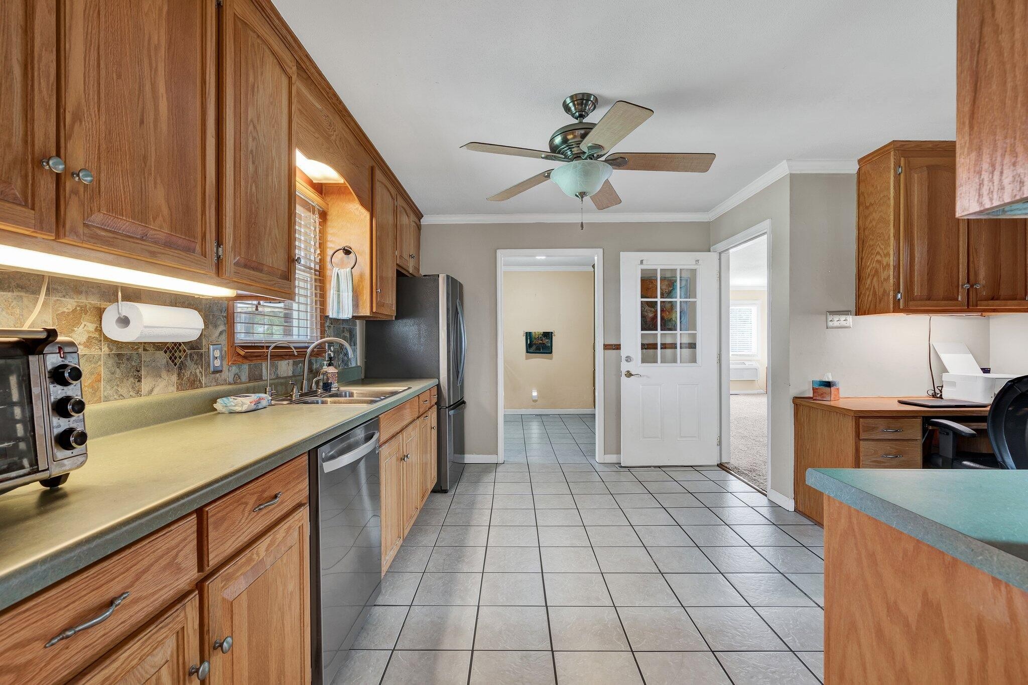 470 Armstrong Road Southeast Cleveland, TN 37323 - Photo 15 of 57 a large kitchen with stainless steel appliances granite countertop a sink and cabinets