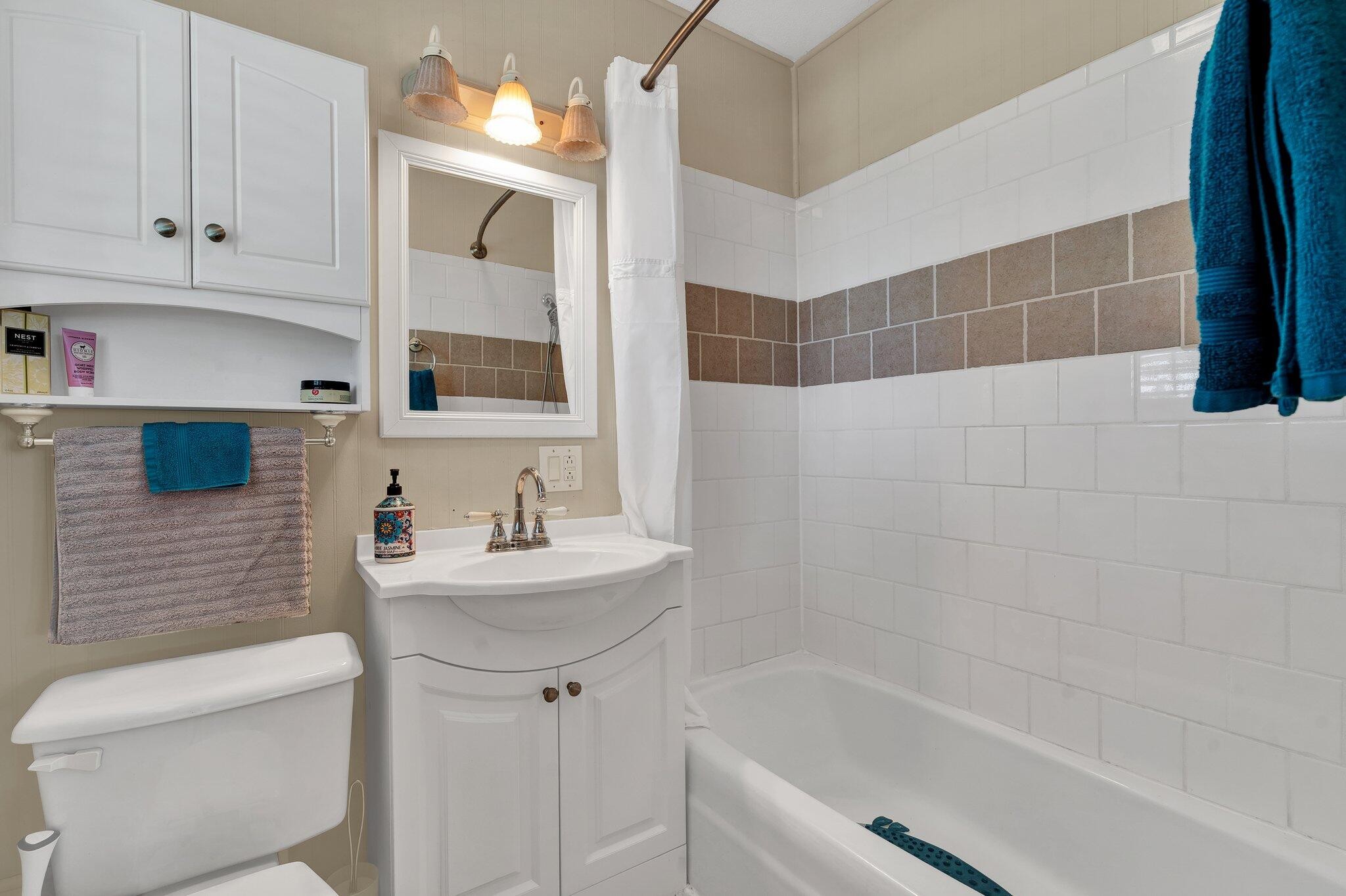 470 Armstrong Road Southeast Cleveland, TN 37323 - Photo 33 of 57 a bathroom with a sink a toilet and shower